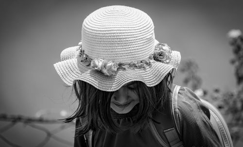 Portrait of woman / child wearing knit hat