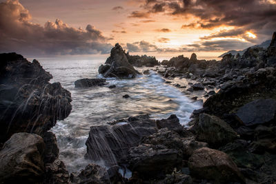 Scenic view of sea against sky during sunset