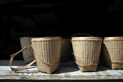 Close-up of wicker baskets on table