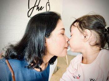 Portrait of mother with daughter