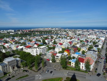 Aerial view of cityscape against sky