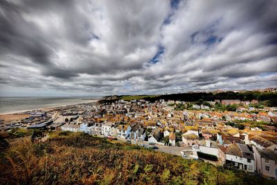 Scenic view of sea against cloudy sky