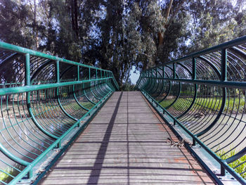 A photo of a wood and steel bridge across the naaman stream in northern israel