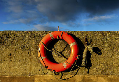 Life preserver on the harbor wall at seahouses, northumberland, england