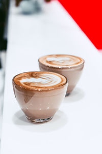 Close-up of coffee cup on table