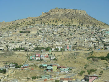 High angle view of houses against clear sky