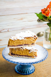 Close-up of cake served on table