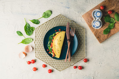 High angle view of breakfast served on table