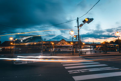 Traffic on road at dusk