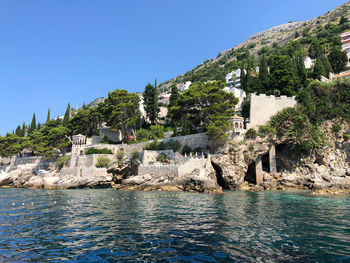 Scenic view of sea against clear blue sky