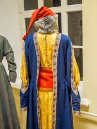 Rear view of man wearing hat standing outdoors