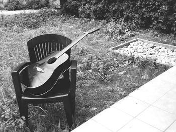 Empty chairs in yard