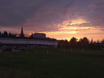 Buildings against sky during sunset