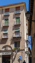 Low angle view of residential building against sky