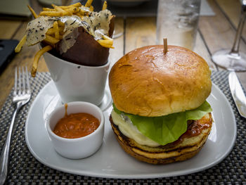 Close-up of fast food in plate on table