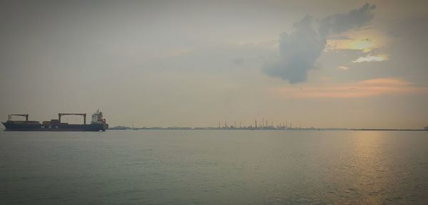 Scenic view of sea at sunset