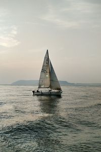 Boat sailing in sea