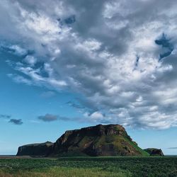 Scenic view of land against sky