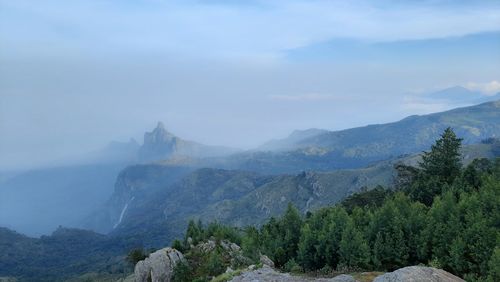 Beautiful scenic view from kodanad view point ooty of misty rain cloud hill mountain green forest