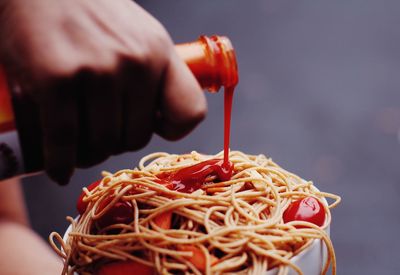 Noodles and hot sauce