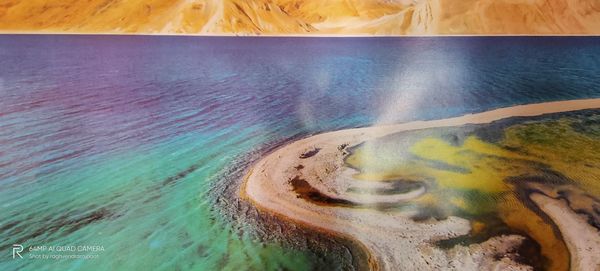 High angle view of water flowing in sea