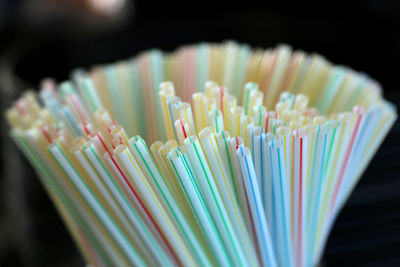 Close-up of multi colored plastic straws
