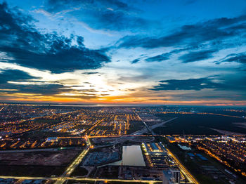 Aerial view of cityscape during sunset