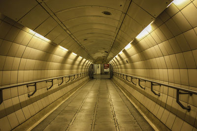 Interior of illuminated subway station