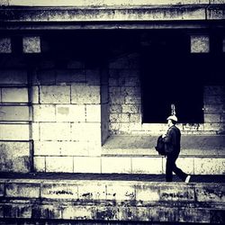 Full length of woman standing in building