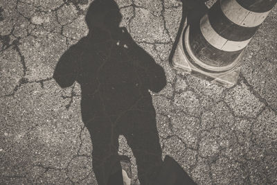 Low section of people standing on street