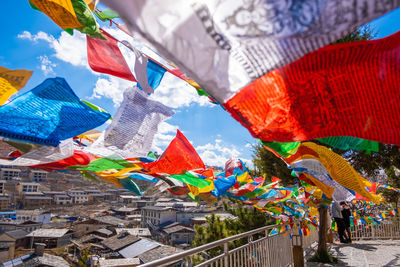 Buntings hanging against sky