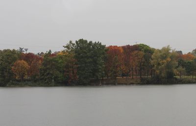 Scenic view of calm lake against clear sky