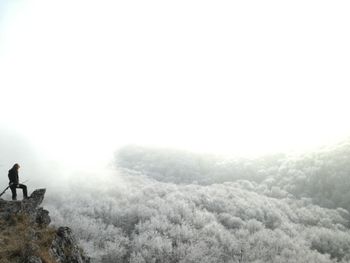 Scenic view of mountains against sky during winter