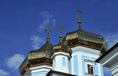 Low angle view of ornate building against sky