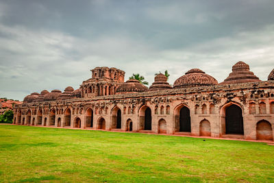 View of historical building against cloudy sky