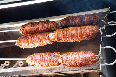 High angle view of meat on barbecue grill