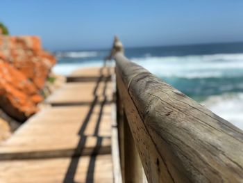 Close-up of wood against sea