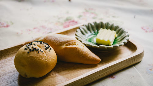 Close-up of fresh food served in tray on table