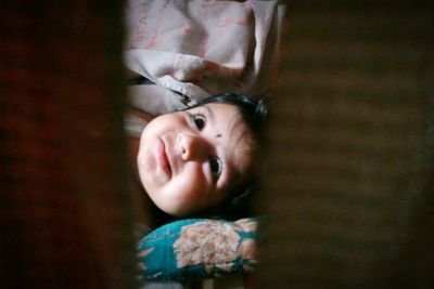 Portrait of cute baby girl at home