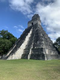 Low angle view of old ruin building against sky