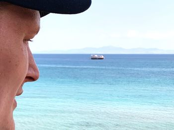 Man on sea against sky