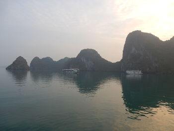 Scenic view of sea against sky at sunset