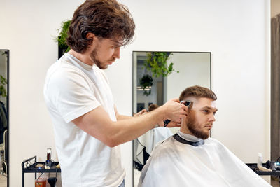 Side view of man working at home