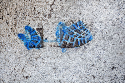 High angle view of blue sand on beach