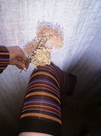 High angle view of woman holding umbrella