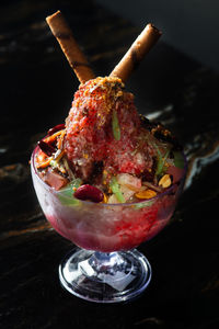 Close-up of ice cream in glass on table