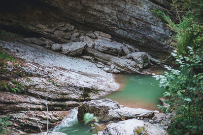 Scenic view of river amidst rocks