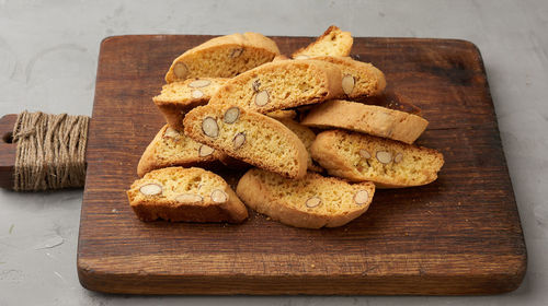 High angle view of cookies on cutting board