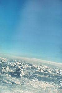 Aerial view of cloudscape against blue sky