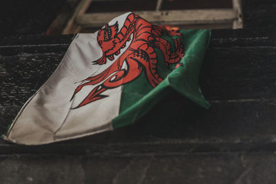 High angle view of flag on paper